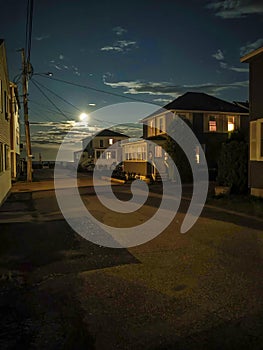 Full Moon Shines on Street