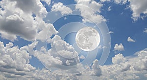 Full Moon in the sky with clouds photo
