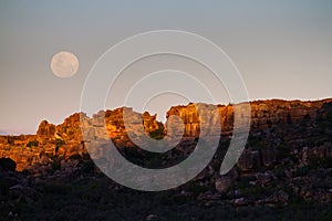 Full moon sunset photo