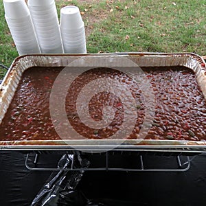 A Full Pan of Baked Beans at a Summer Barbecue