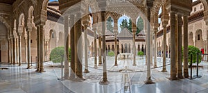 Full panoramic exterior view at the Patio at the Lions, twelve marble lions fountain on Palace of the Lions or Harem, Alhambra photo