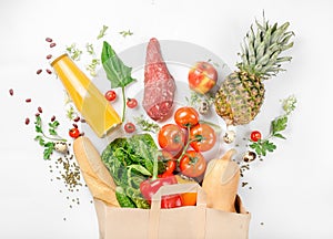 Full paper bag of healthy food on white background