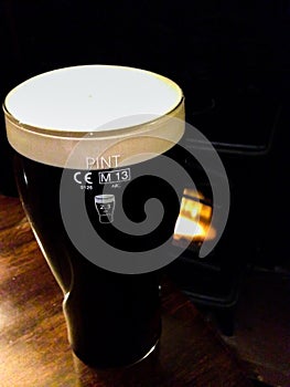 Full Pint of Guinness beer photo