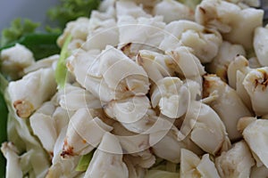 Full plate of fresh crab meat of boiled stone Crab decorated with vegetable side dish, Cheliped of the crab