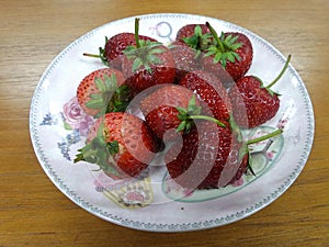 Full plate of fresh red strawberry
