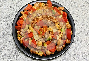 A full plate of vegetarian food attached to a pan photo