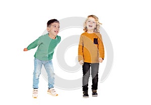 Full portrait of two children playing and laughing