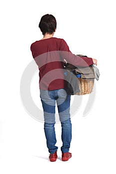 full portrait of a woman with a laundry basket on white background