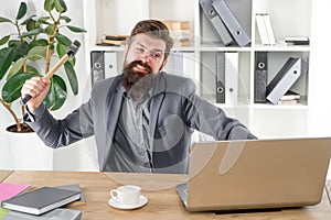 Full of rage. frustrated computer user. businessman express anger. ready to smash. Office life makes him crazy. Slow