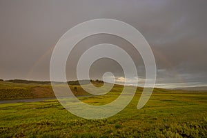 Full Rainbow Over Hayden Valley On Rainy Day