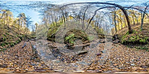 Full seamless hdri 360 panorama near mountain stream in tree-covered ravine in autumn forest equirectangular spherical projection
