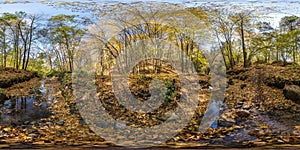 Full seamless hdri 360 panorama near mountain stream in tree-covered ravine in autumn forest equirectangular spherical projection