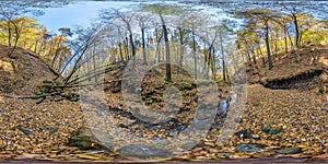 Full seamless hdri 360 panorama high in mountains near stream in tree-covered ravine in autumn forest equirectangular spherical photo