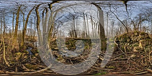 Full seamless spherical hdri 360 panorama view near concrete bridge with stones covered with green moss and forest near swamp in