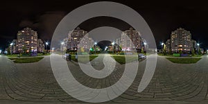 Full seamless spherical hdri night panorama 360 degrees angle view on crossroads of pedestrian street with light in windows of