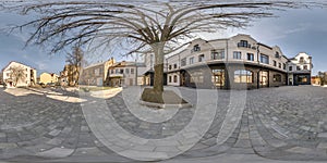 Full seamless spherical hdri panorama 360 degrees angle near old houses and big tree in courtyard or backyard of city bystreet in