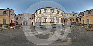 Full seamless spherical hdri panorama 360 degrees angle near old houses in narrow courtyard or backyard of city bystreet in