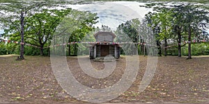 Full seamless spherical hdri panorama 360 degrees angle near wooden decorative pagan church in the forest in equirectangular