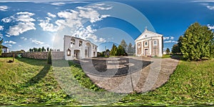 Full seamless spherical hdri panorama 360 degrees angle in small village with decorative medieval style architecture church in