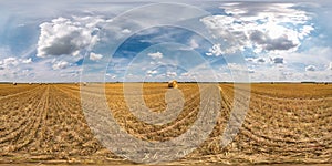 Full seamless spherical hdri panorama 360 degrees angle view among harvested rye and wheat fields with Hay bales in summer day