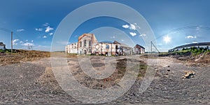 Full seamless spherical hdri panorama 360 degrees angle view near abandoned ruined factory hangar without roof in equirectangular