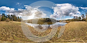 Full seamless spherical panorama 360 degrees angle view on the shore of wide river neman in evening with beautiful clouds in