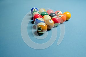 A full set of pool balls on pool table