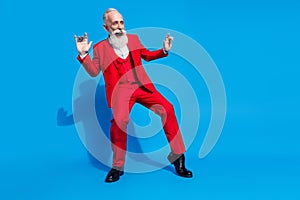 Full size photo of cheerful aged man dandy happy positive smile dance party club isolated over blue color background