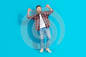 Full size photo of funny funky optimistic man wear plaid shirt denim pants indicating at himself isolated on blue color