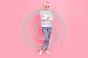 Full size photo of mature pretty woman crossed hands smart wear casual outfit isolated over pink color background