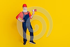 Full size photo of professional workman carpenter use loud speaker proclaim message isolated bright color background