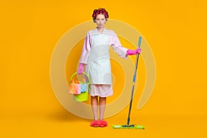 Full size photo of sad girl hold bucket bottle spray mop wear gloves bath robe isolated shine color background