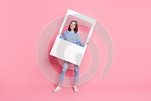 Full size photo of young pretty positive girl take shoot party holding white photo frame  on pink color