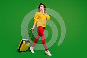 Full size profile photo of excited lady rolling suitcase go registration flight airline change tickets to business class