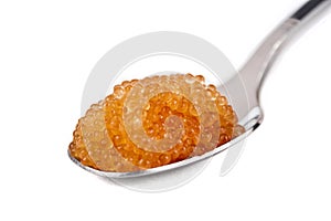 Full spoon of red caviar isolated