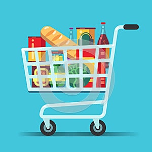 Full supermarket shopping cart. Shop trolley with food. Grocery store vector icon photo