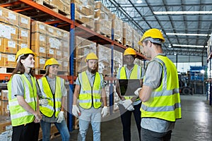 Full team engineering warehouse worker meeting brainstorm. Teamwork professional workshop in warehouse store. Logistics factory