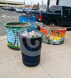 Full trash can on the street in Eastern Market in Detroit, Michigan.