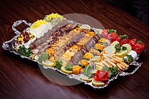 Full view of Persian Mix Kebab of minced meat and chicken With R photo