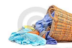 Full wicker laundry basket isolated photo