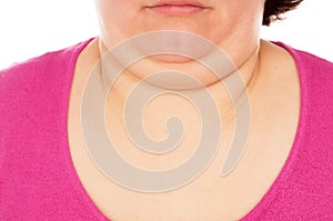 Full woman shows the second chin photo