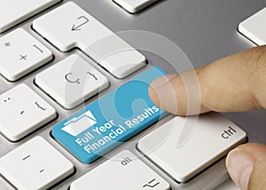 Full Year Financial Results - Inscription on Blue Keyboard Key