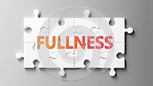 Fullness complex like a puzzle - pictured as word Fullness on a puzzle pieces to show that Fullness can be difficult and needs