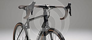 A fullsized bicycle against a backdrop