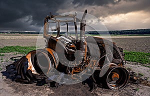 Fully destroyed burnt down tractor