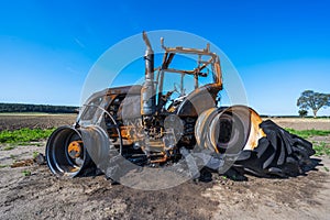 Fully destroyed burnt down tractor