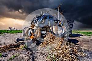 Fully destroyed burnt down tractor