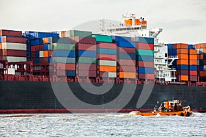 Fully laden container ship in port