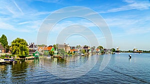 Fully operational historic Dutch Windmills and houses along the Zaan River