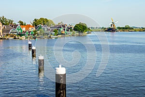 Fully operational historic Dutch Windmills and houses along the Zaan River